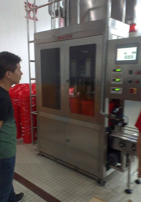1489304056762911.jpg 液體灌裝機,稱(chēng)重灌裝機,定量灌裝機
